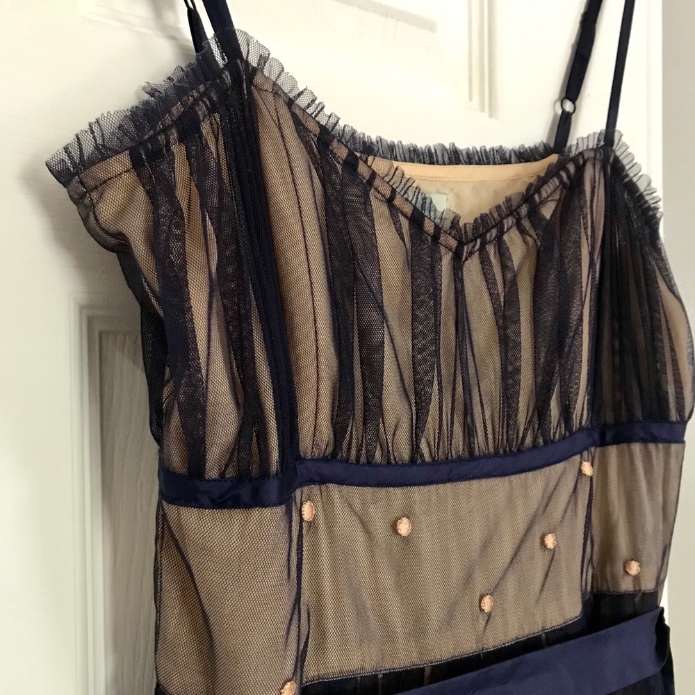 Anthro dress. Peach w/ purple embroidered overlay
